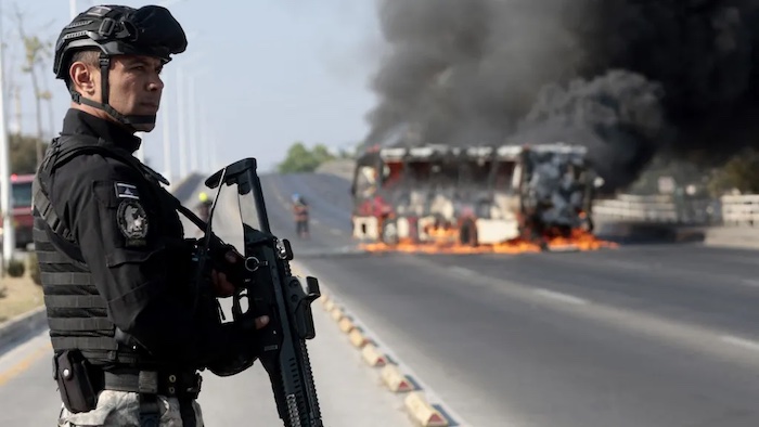Cartel retaliation spreads across Mexico as roadblocks burn, arrests mount and foreign governments i...
