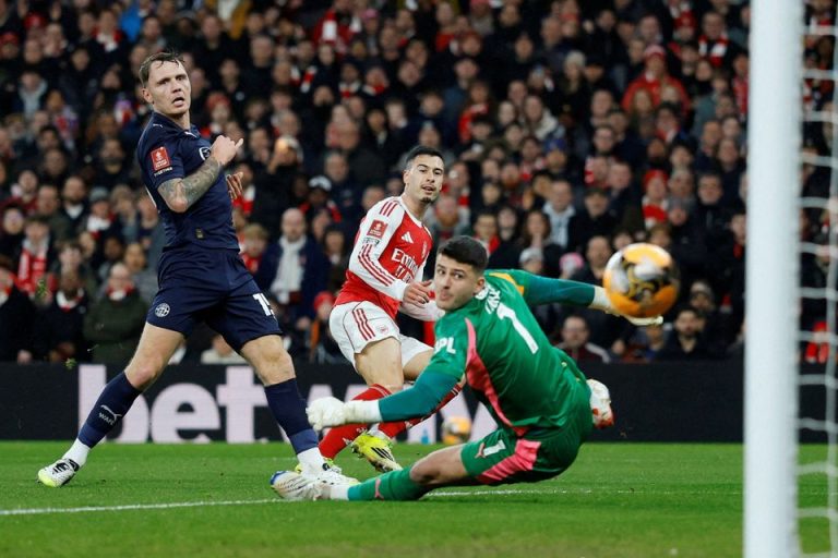 Arsenal scored four goals in the opening 30 minutes as they cruised 4-0 past Wigan to reach the FA C...