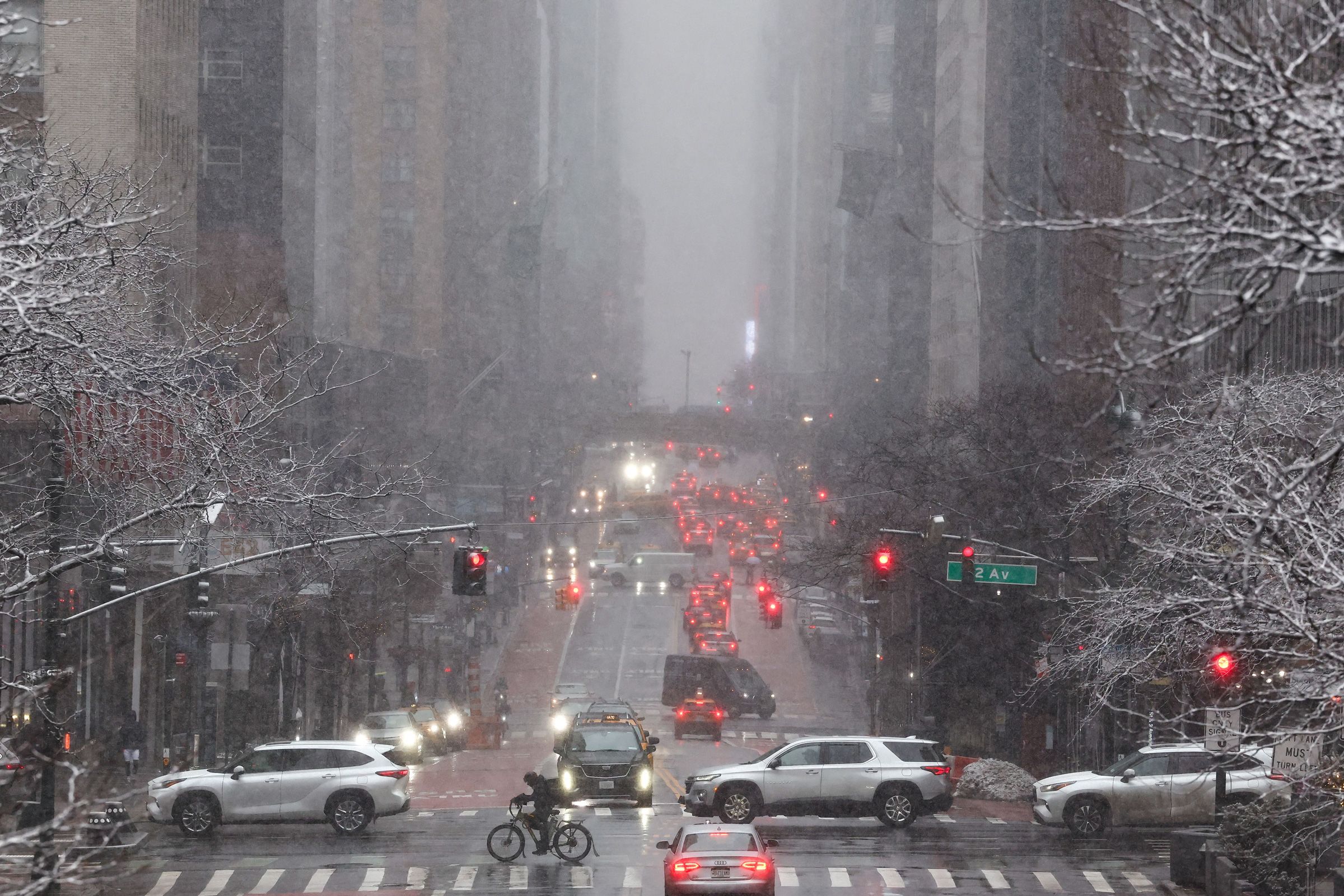 New York City imposes full travel ban as a historic winter storm hits the northeast, canceling fligh...