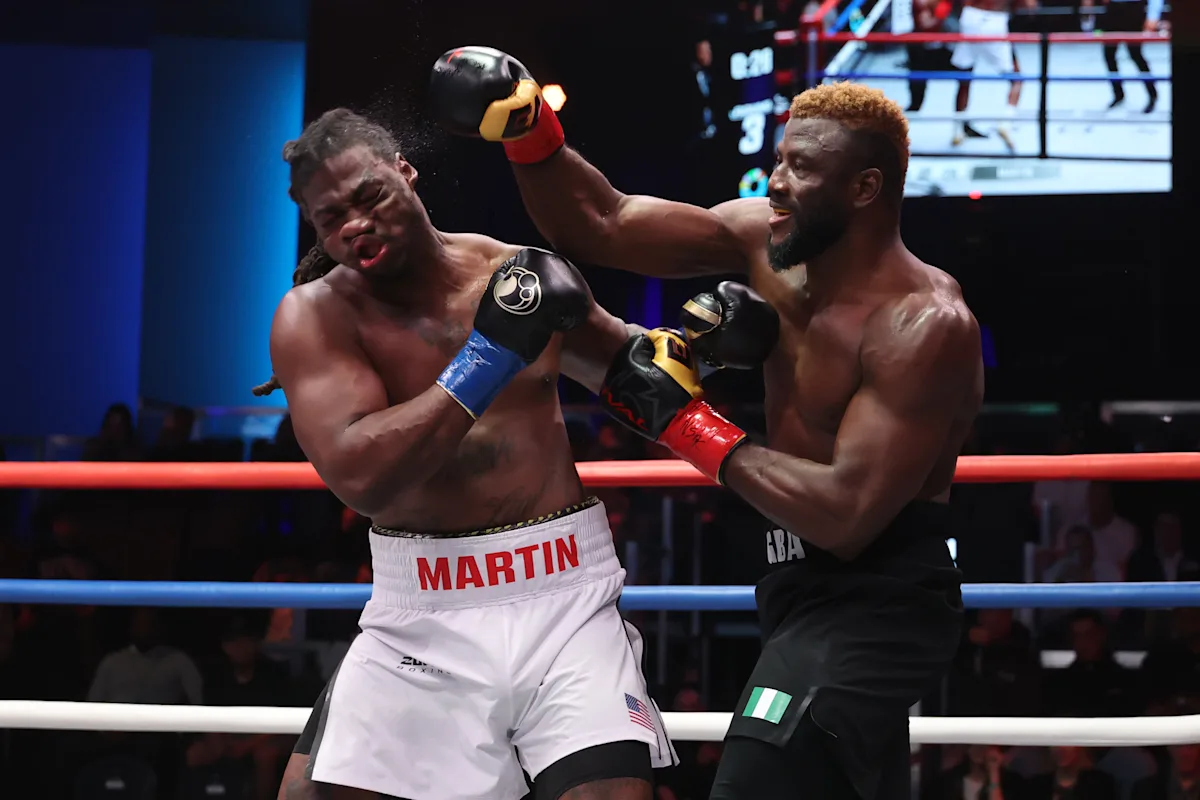 Nigerian heavyweight Efe Ajagba stopped former champion Charles Martin in fourth-round knockout to b...
