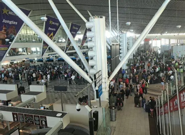 Fire outbreak at Cape Town airport disrupts international flights, forces evacuations, and affects I...