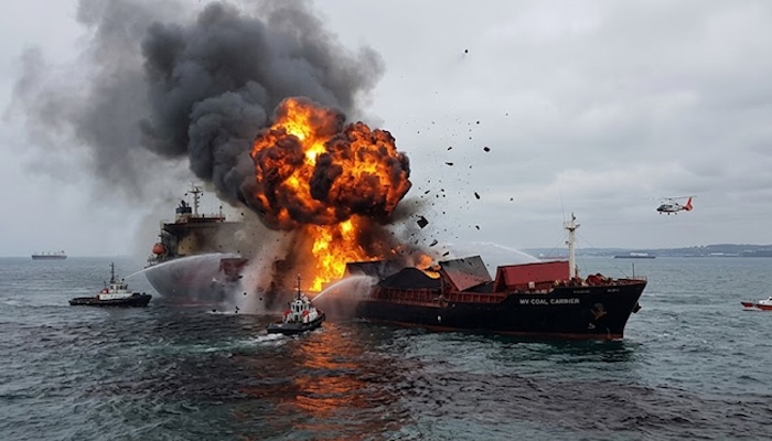Cargo ship erupts in flames in Strait of Hormuz after three vessels struck by mysterious projectiles...