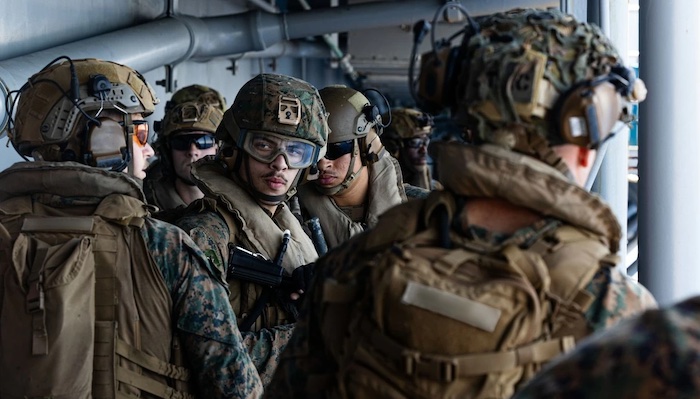US troops arrive amid intensifying Iran conflict while millions rally nationwide against President T...