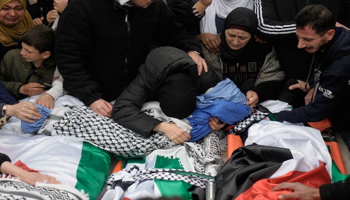 Israeli forces open fire on family car in West Bank, killing Palestinian couple and two children dur...