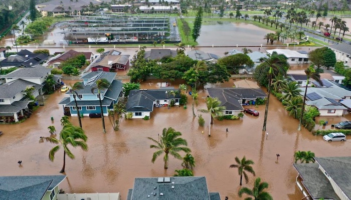 Thousands evacuate as severe storm triggers flash floods across Hawaii, with Oahu and Maui under thr...