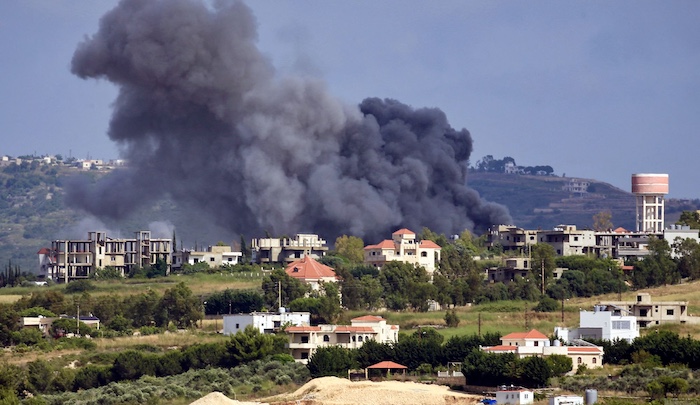 Israel has carried out air raids on Hezbollah targets in Lebanon after the group launched missiles a...