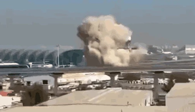 Two drones fell near Dubai International Airport, injuring four people, though flights continue as n...