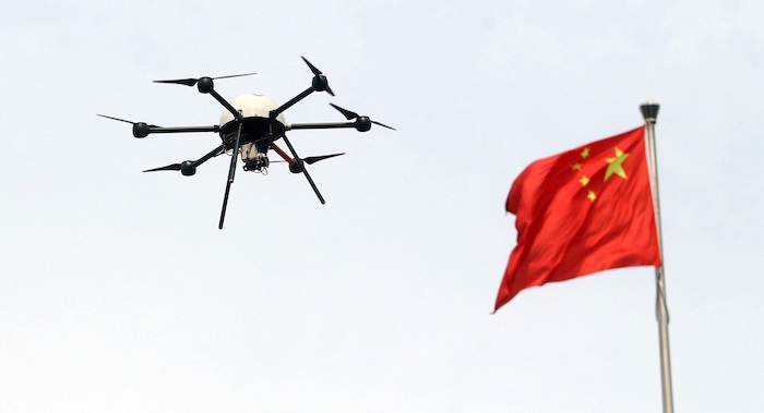 China is set to ban the sale of drones in Beijing and require permits to fly them under new rules....