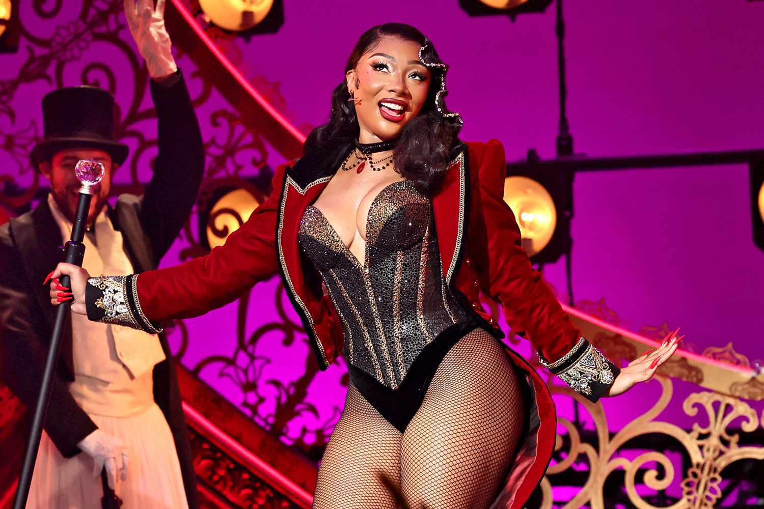 Megan Thee Stallion is hospitalised after falling ill mid-performance, forcing abrupt halt to Moulin...
