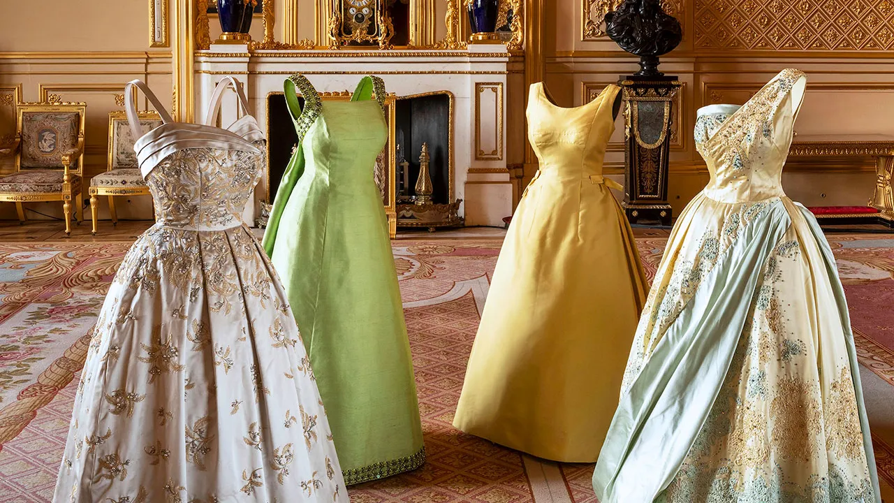 New Buckingham Palace exhibition displays Queen Elizabeth II’s wardrobe, highlighting fashion as dip...