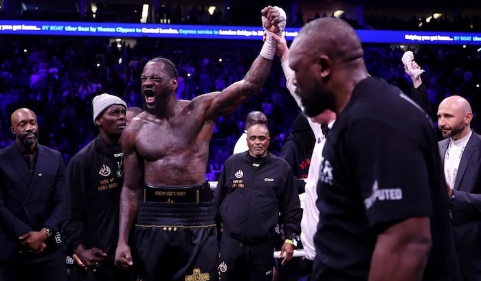 Deontay Wilder outlasts Derek Chisora in punishing London clash, earning split decision victory in l...