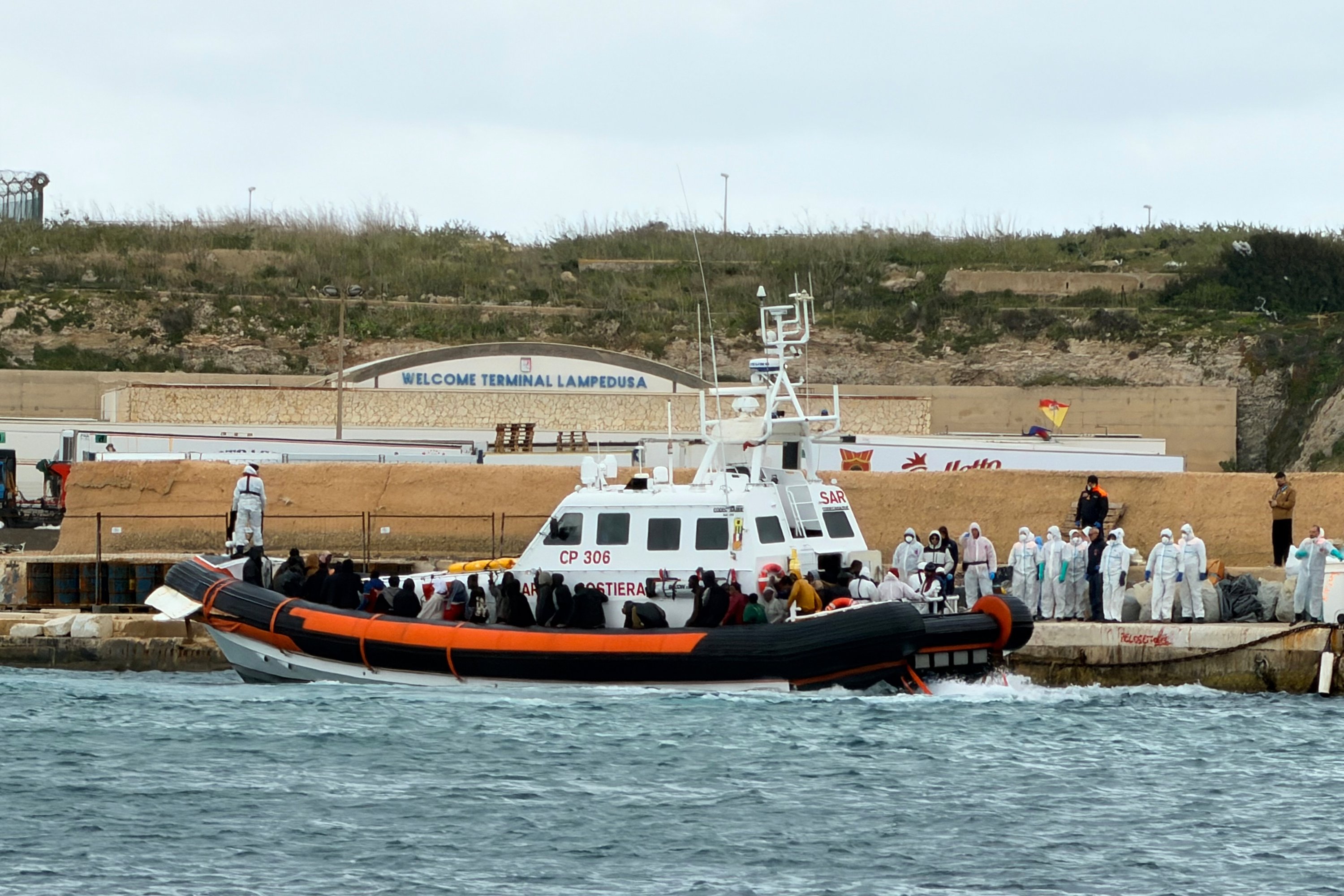 Nineteen migrants found dead near Lampedusa as Italian coastguard rescues survivors, with some hospi...
