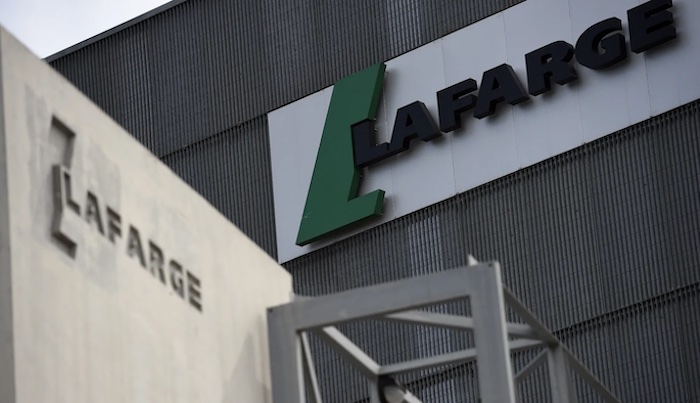 A French court convicts Lafarge of financing terrorism in Syria, jailing executives and imposing max...