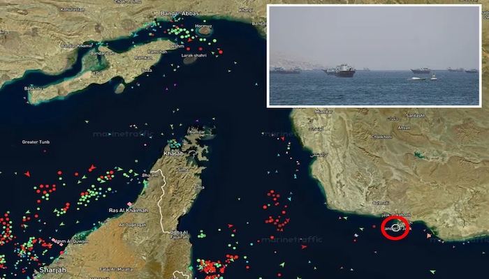 An Iranian media report says a US Navy vessel was struck by two missiles near Strait of Hormuz after...