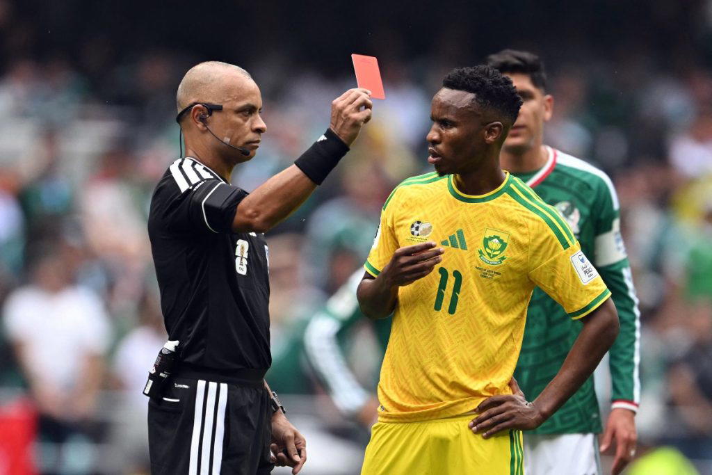 Mexico ignited their World Cup party with a dominant 2-0 victory over nine-man South Africa on Thurs...