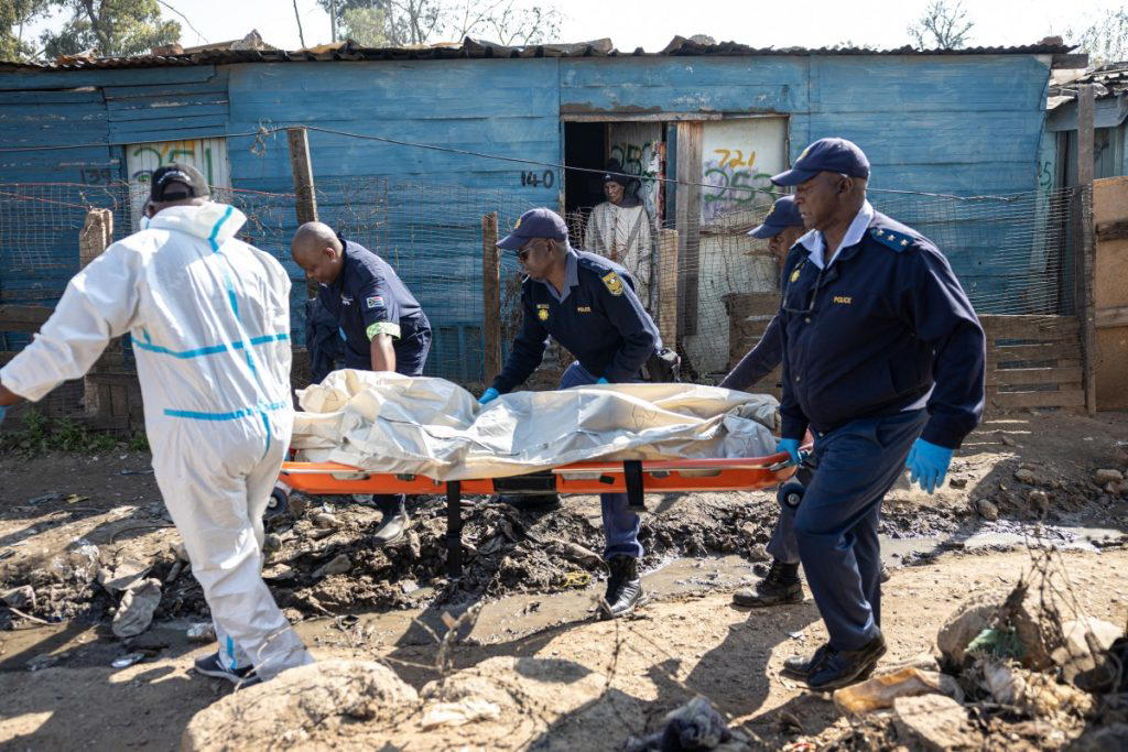 Gunmen stormed an informal settlement near Johannesburg and shot dead 12 people overnight, South Afr...