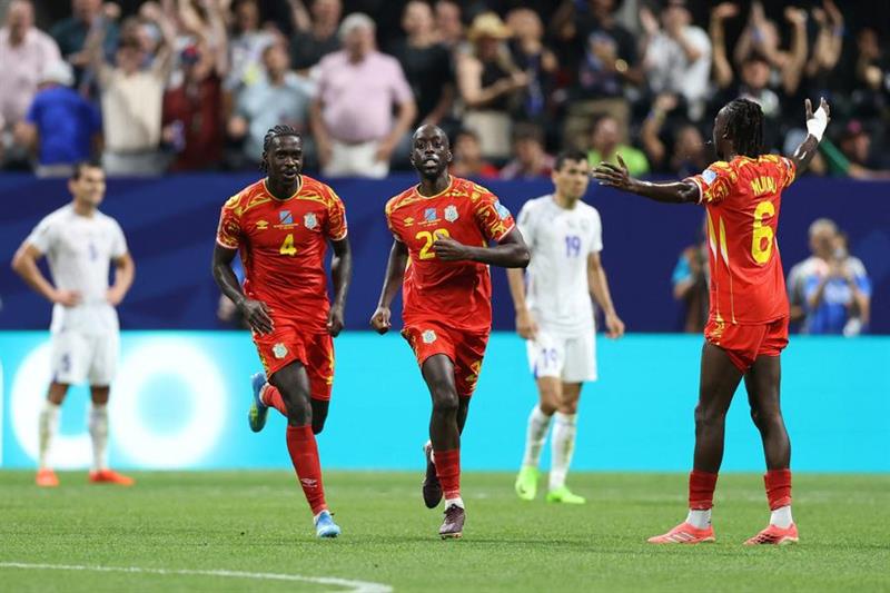 DR Congo overturned a first-half deficit against Uzbekistan to secure a historic first-ever place in...