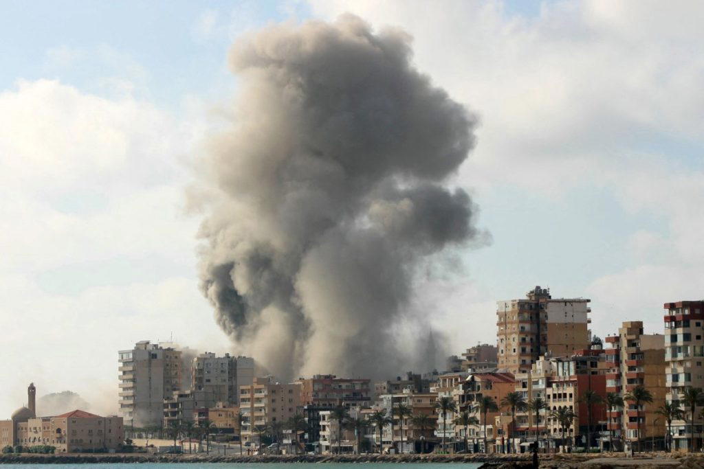 Iran threatened to retaliate against the United States and Israel for a fresh attack on Beirut on Su...