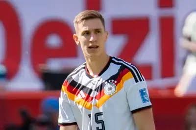 Defender Nico Schlotterbeck is out of the World Cup after injuring a left-ankle ligament, the German...