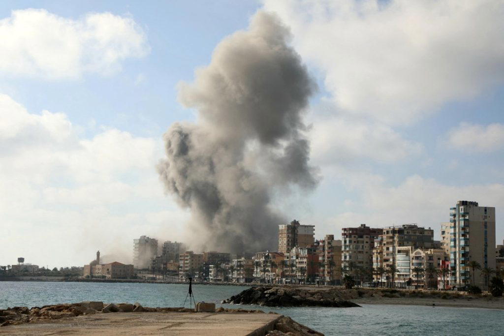 Air raid sirens sounded in Israel on Sunday as its military worked to intercept barrages of incoming...