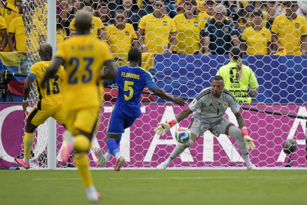 Curacao goalkeeper Eloy Room was the hero on Saturday as the tiny Caribbean island claimed its first...