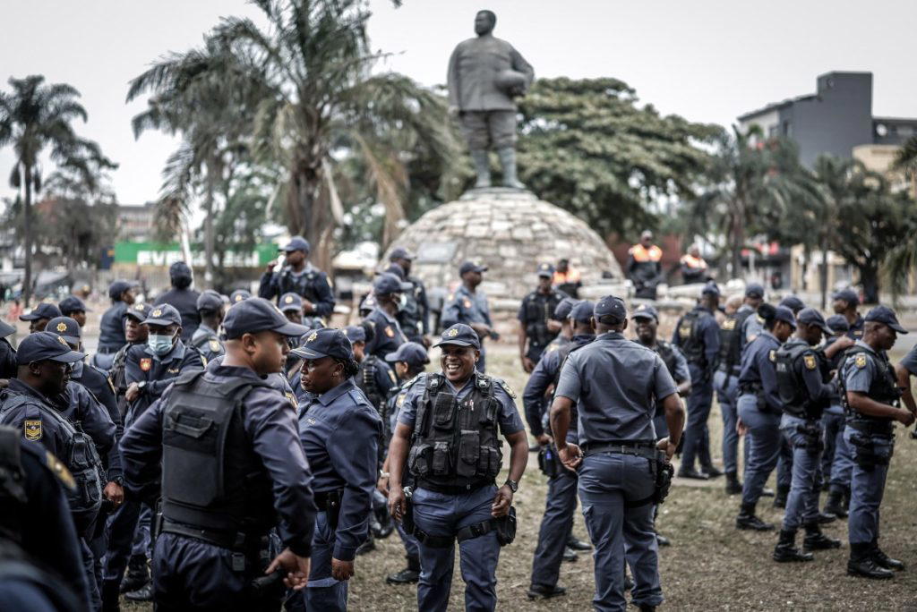 South African police deployed to head off unrest and protests on Tuesday, the unofficial deadline se...