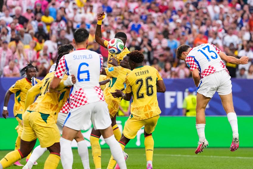Nikola Vlasic’s header secured Croatia’s knockout place, while Ghana advanced among the best third-p...