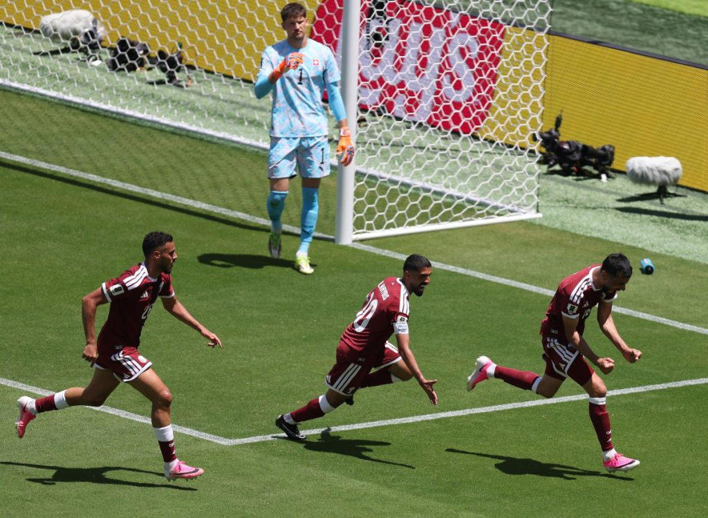 Qatar’s Boualem Khoukhi stunned Switzerland with a late equaliser as the sides played out a 1-1 draw...