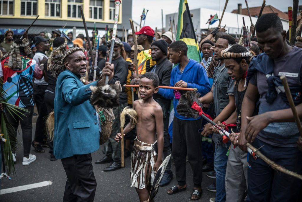 Thousands of people marched Tuesday in cities across South Africa to demand the departure of undocum...