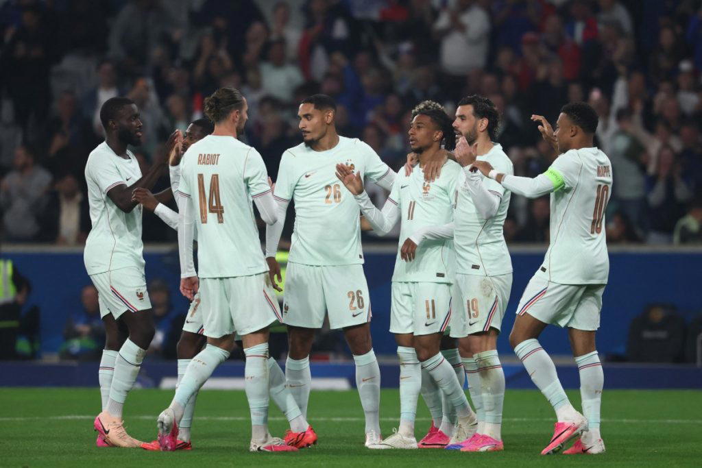 Michael Olise sparkled brightest in a star-studded France attack on Monday, hitting a hat-trick in a...