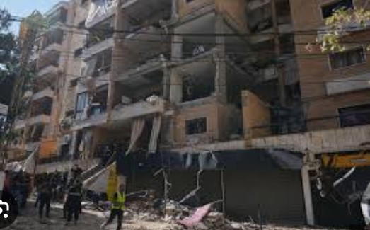 Iran threatened to retaliate against the United States and Israel for fresh strikes in Beirut on Sun...