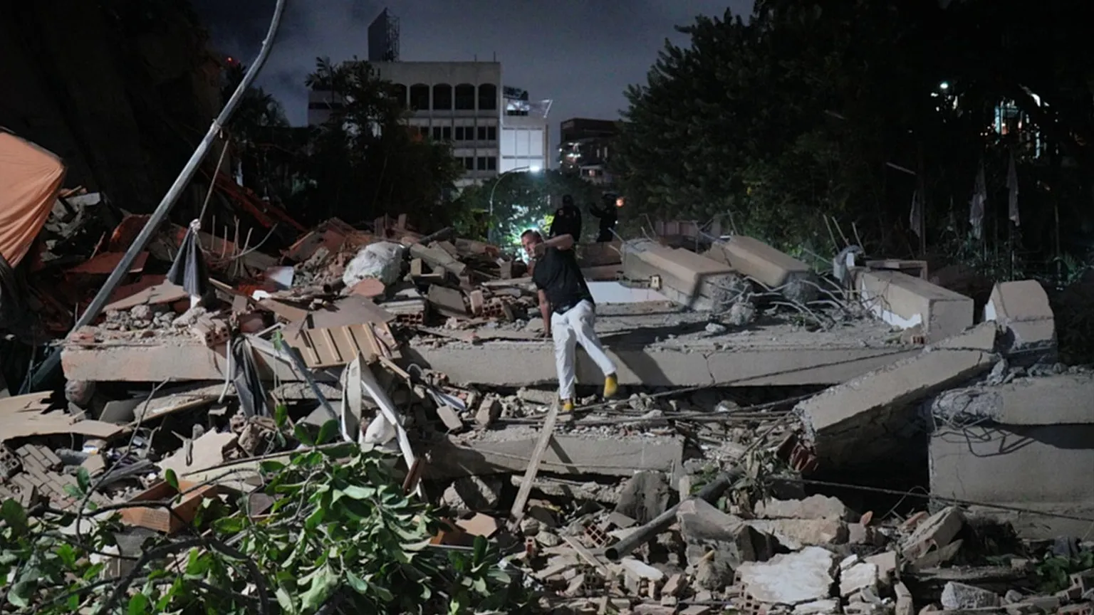 Back-to-back earthquakes trigger widespread destruction, trapping residents and disrupting transport...