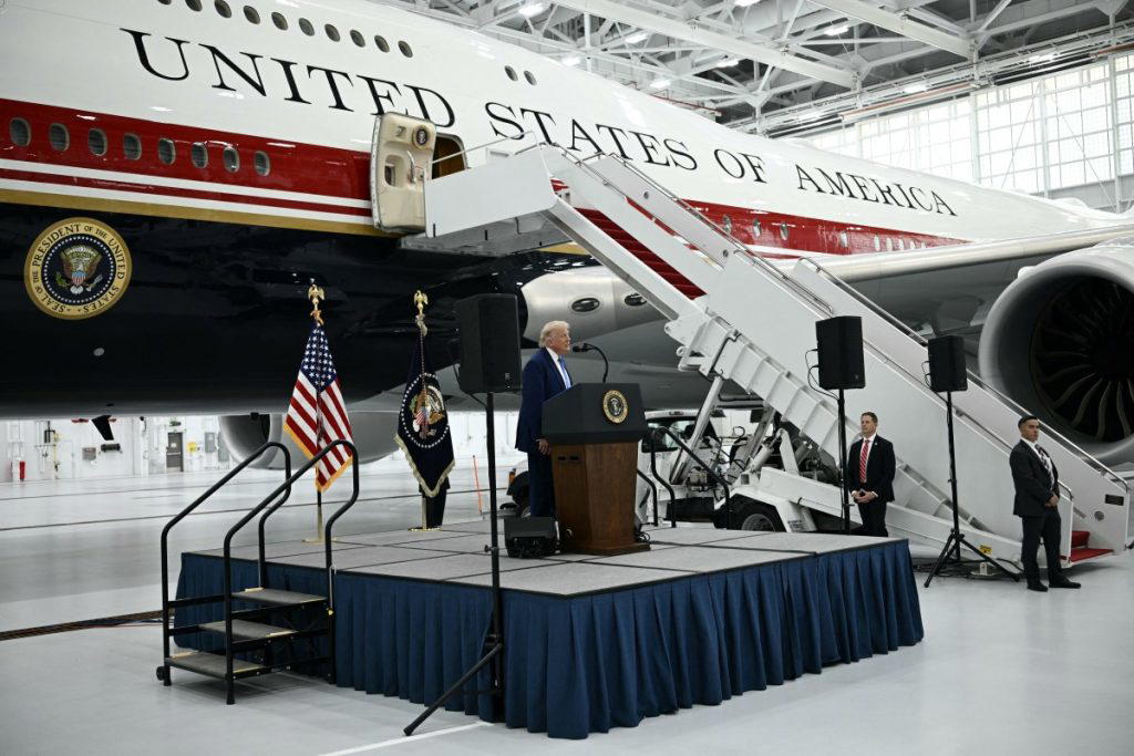 US President Donald Trump unveiled on Friday a replacement Air Force One aircraft gifted by Qatar, w...