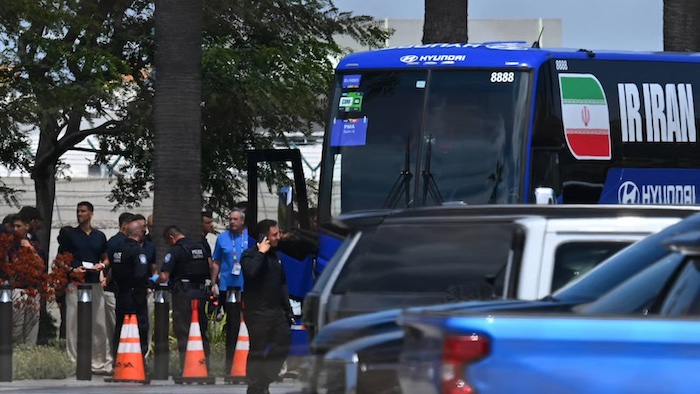 Iran's national team lands in the US for its World Cup opener against New Zealand after a peace deal...