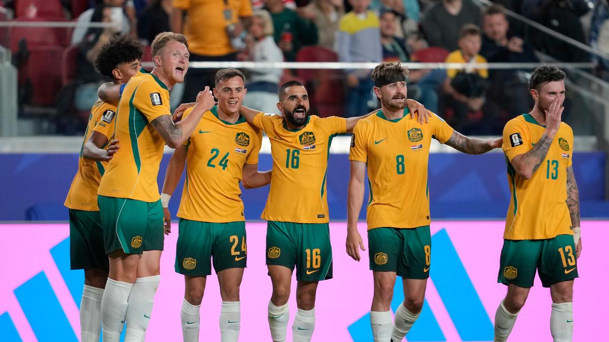Australia book their place in World Cup last 32, while Paraguay move closer to knockout qualificatio...