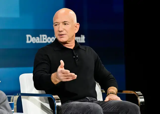 Amazon founder Jeff Bezos has held talks about joining the Amit Bhatia-fronted consortium that has e...