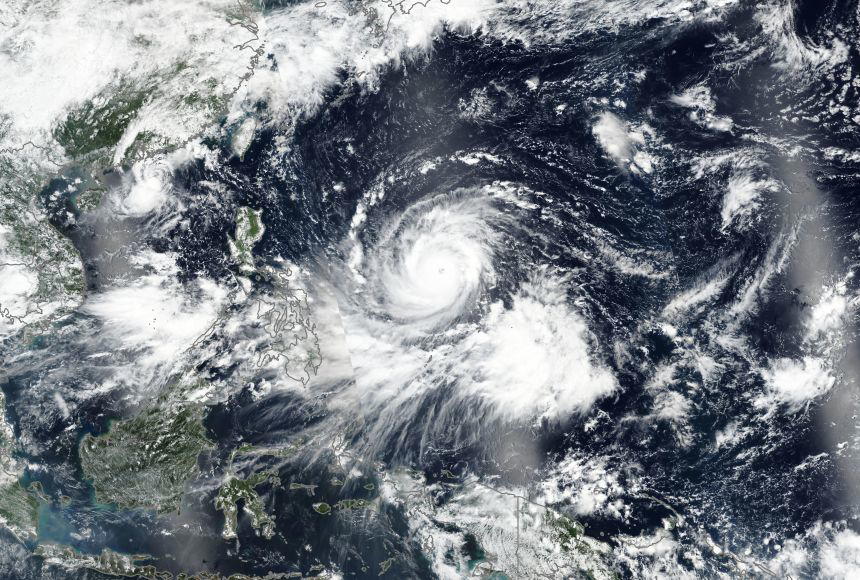 People in Guam and the Northern Marianas moved to emergency evacuation centers and made last-minute...