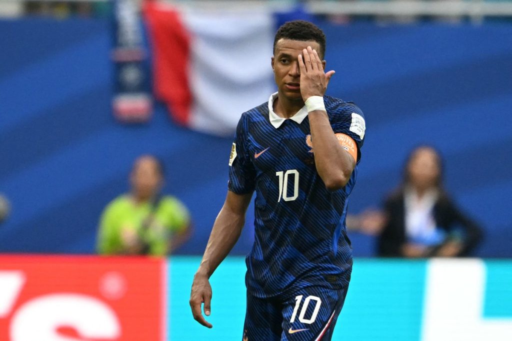 Didier Deschamps’ final match as France coach ended in defeat, but Kylian Mbappe etched his name int...