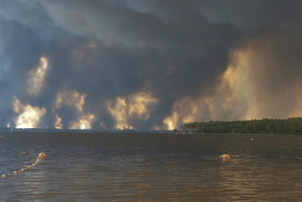 France and Spain evacuated more than 160,000 people as unprecedented forest fires ravaged areas on S...