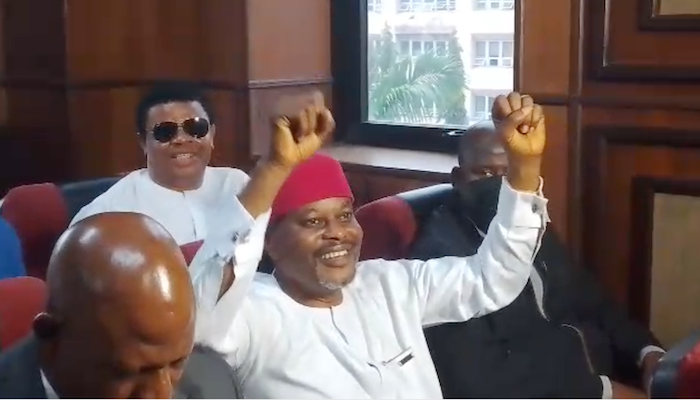 Ex-minister Nnaji dressed in white appered in court to answer allegations of certificate forgery fro...