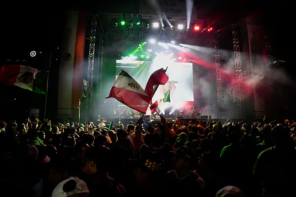 At least two people died on Wednesday during massive celebrations in Mexico City as the national tea...