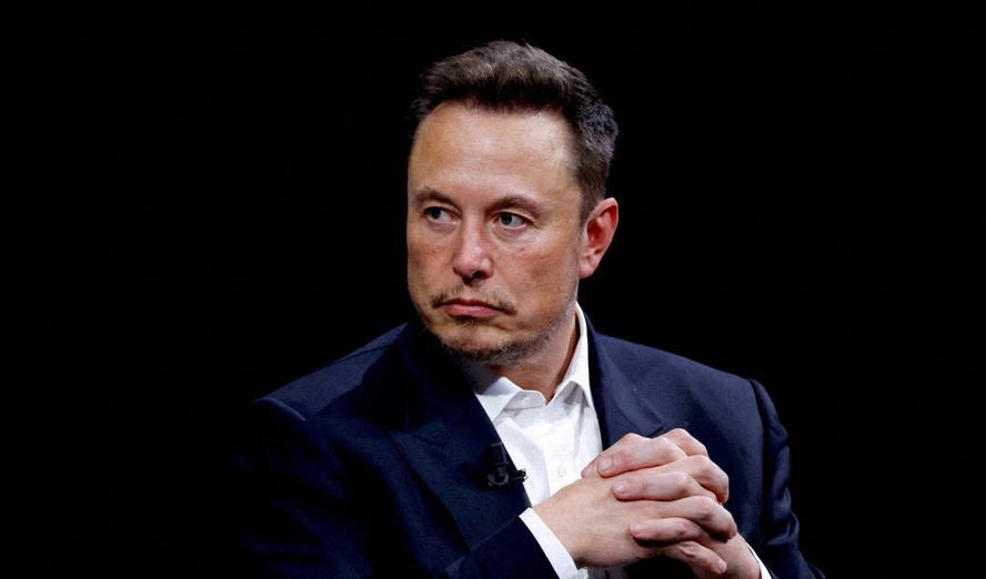 Musk says artificial intelligence and robots will create unprecedented abundance, making traditional...