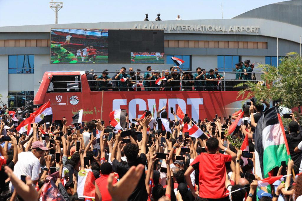 Hundreds of euphoric supporters welcomed home Egypt’s national football team on Friday after the cou...