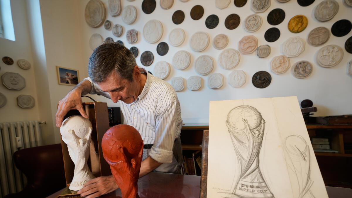 The Italian sculptor who designed the FIFA World Cup trophy wanted to capture three sporting emotion...