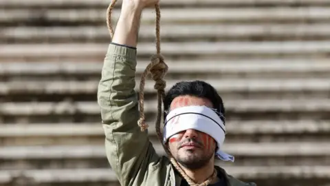 Iran’s judiciary announced that two men were hanged on Sunday over charges relating to anti-governme...