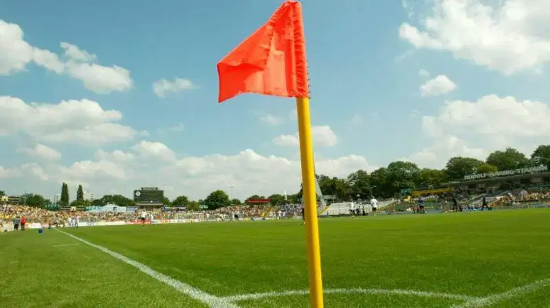 A female assistant referee suffered a concussion after she was knocked to the ground while attemptin...