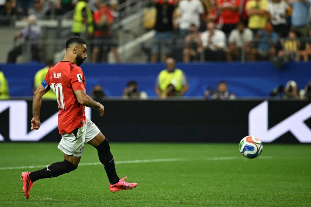 A nerveless Mohamed Salah said he decided only at the last moment to chip in his penalty under massi...