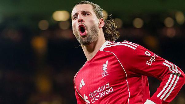 Liverpool midfielder Dominik Szoboszlai signed a new five-year contract on Friday, ending speculatio...