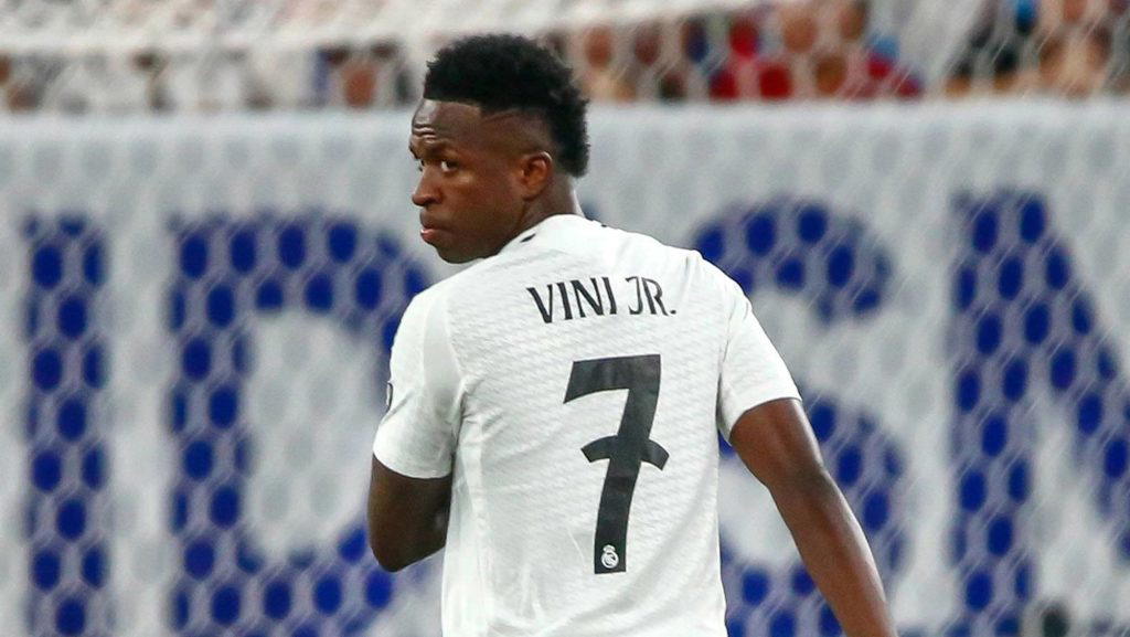 Real Madrid forward Vinicius Junior is reportedly ready to turn down interest from Arsenal as he loo...