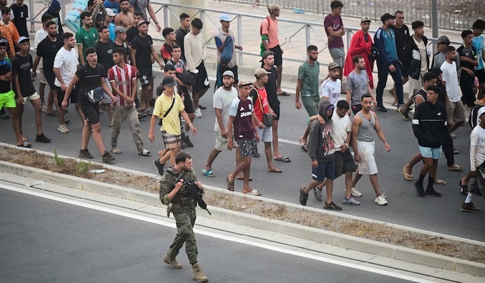 Italy temporarily reinstates border checks with Spain after migrant surge in Ceuta triggers diplomat...